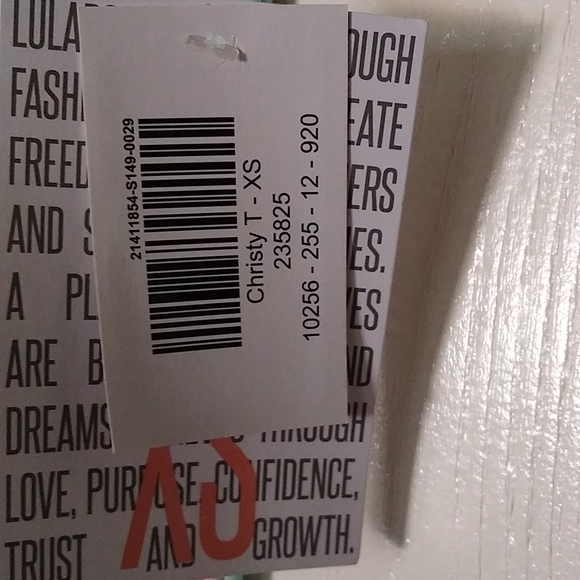 Lularoe, ChristyT - extra small light green with red wolves on it. New with tag - Picture 3 of 3
